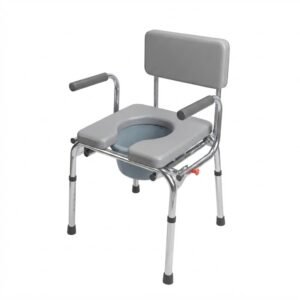 Angled view of a medical-grade bedside commode chair featuring a grey cushioned backrest, padded seat with cut-out, chrome-plated steel frame, and included bucket.