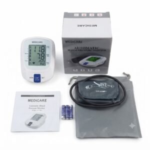 Full unboxed kit of the Medicare automatic blood pressure monitor including the main monitor unit, storage pouch, upper arm cuff, user manual, box, and batteries.