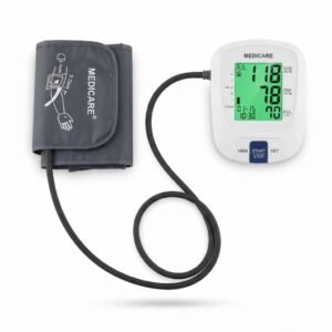 Medicare digital blood pressure monitor with digital LCD screen showing blood pressure readings connected to a standard upper arm cuff via a black tube.