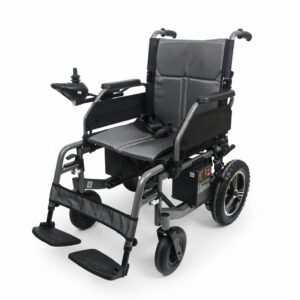 Grey foldable electric wheelchair with lightweight metallic frame, cushioned grey mesh seat, and left-side joystick controller on a pure white background