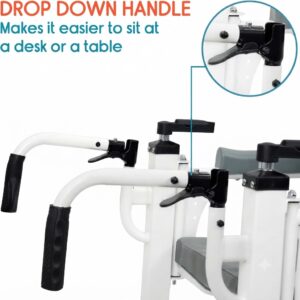 Detailed view of the drop-down handle mechanism on the patient transfer chair allowing easier access to desks or tables.
