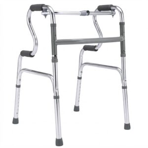 A three-quarter front view studio photograph of a silver aluminum folding medical walker with gray padded handgrips and adjustable height legs, set against a clean white background.