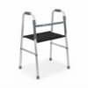 : Studio shot of a lightweight folding adult walker in silver with a black supportive fabric seat and handgrips.