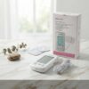 Medicare 3-in-1 TENS Therapy Device with digital display, electrode pads, and packaging, designed for home pain management and muscle relaxation.