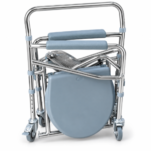 A fully folded, portable chrome commode chair with grey padded armrests and a grey plastic seat, standing upright on four grey casters against a seamless white studio background.