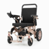 Clean studio view of a modern folding electric wheelchair featuring a lightweight rose-gold aluminum alloy frame, black cushioned seating, adjustable push handle, and all-terrain wheels.